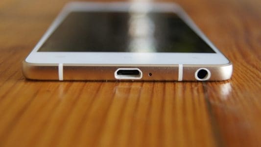 You will find both interface ports at the bottom of the phone.